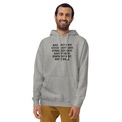 "Bad Day? Knit. Good Day? Knit. Stressed? Knit. Happy? Knit. Inspired? Knit. Knit? Knit!" printed on a carbon grey warn by a male