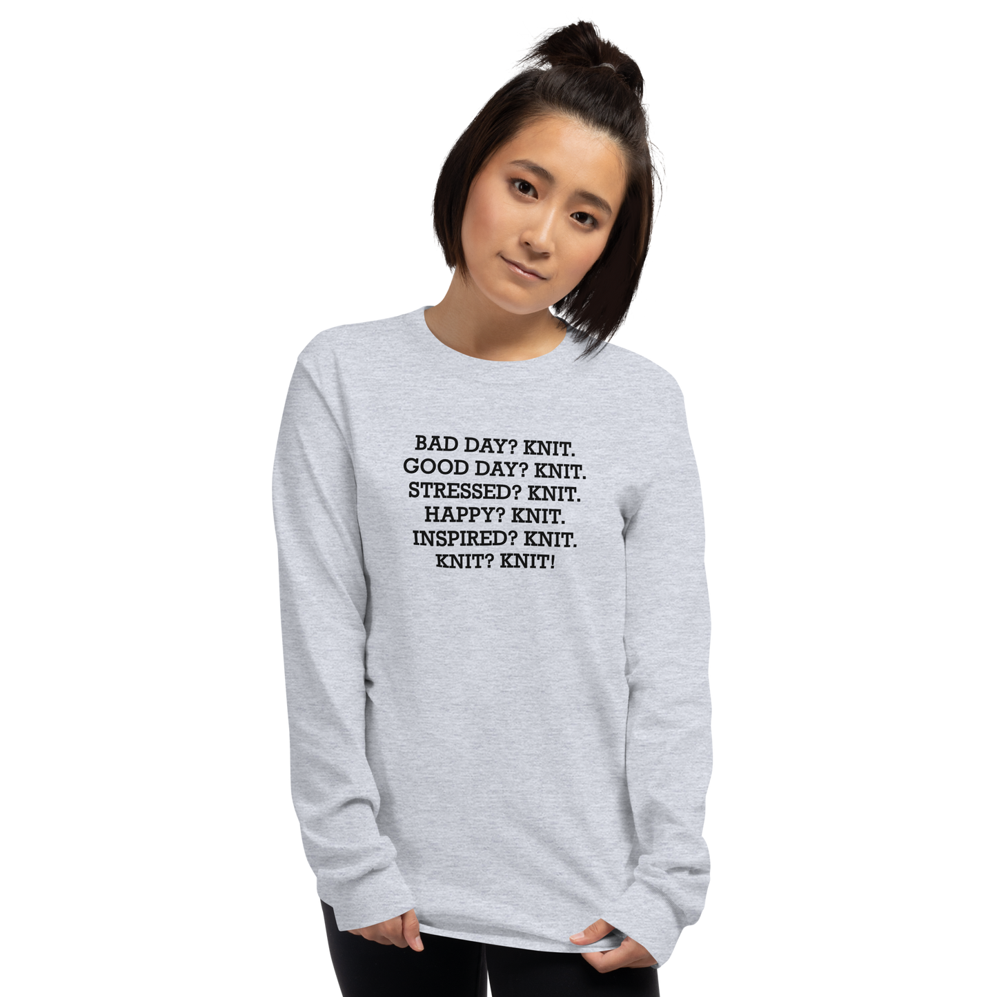 "Bad Day? Knit. Good Day? Knit. Stressed? Knit. Happy? Knit. Inspired? Knit. Knit? Knit!" printed on a sport grey men's long sleeve shirt worn by a female