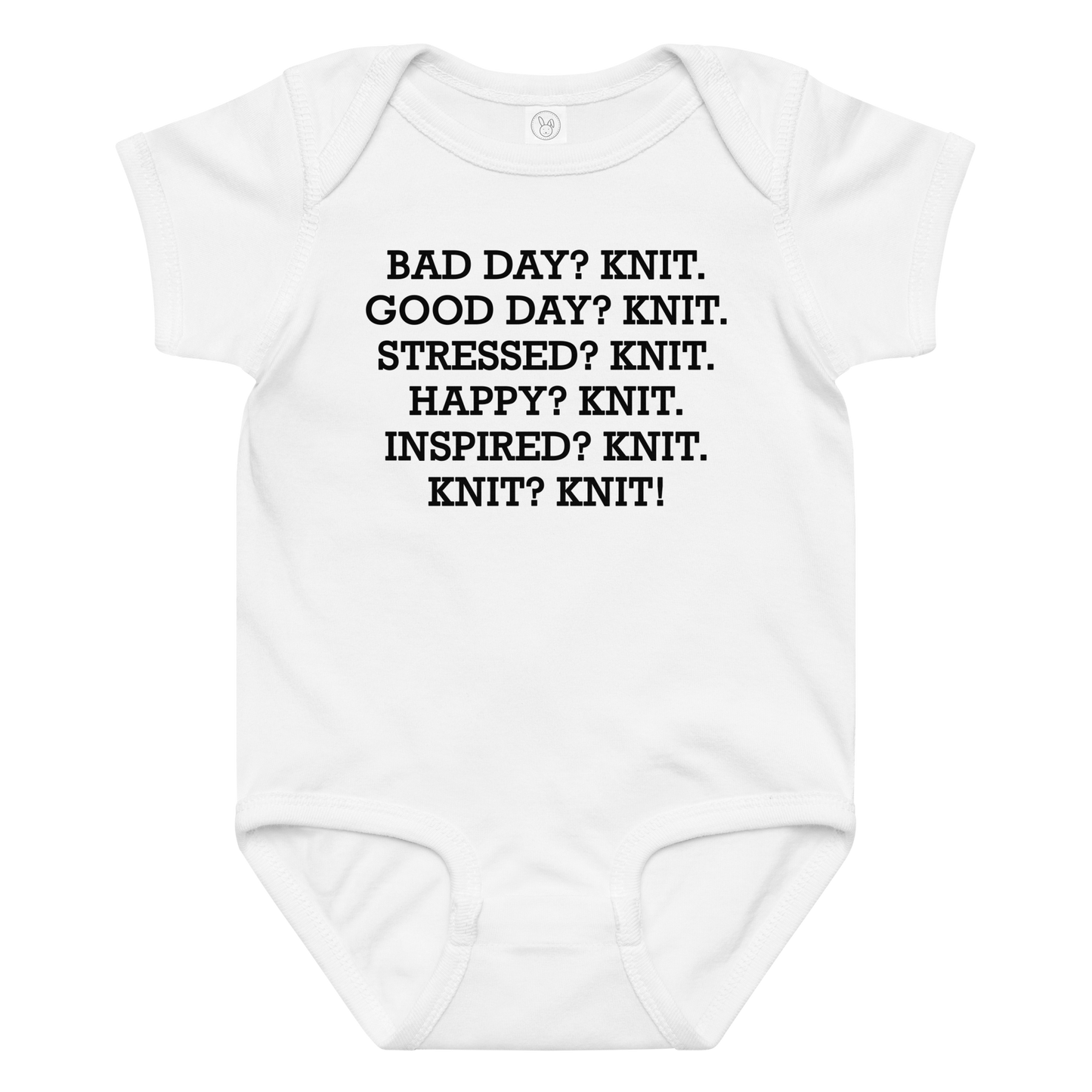 "Bad Day? Knit. Good Day? Knit. Stressed? Knit. Happy? Knit. Inspired? Knit. Knit? Knit!" printed on a white baby jersey bodysuit laying on a flat surface amongst other clothes