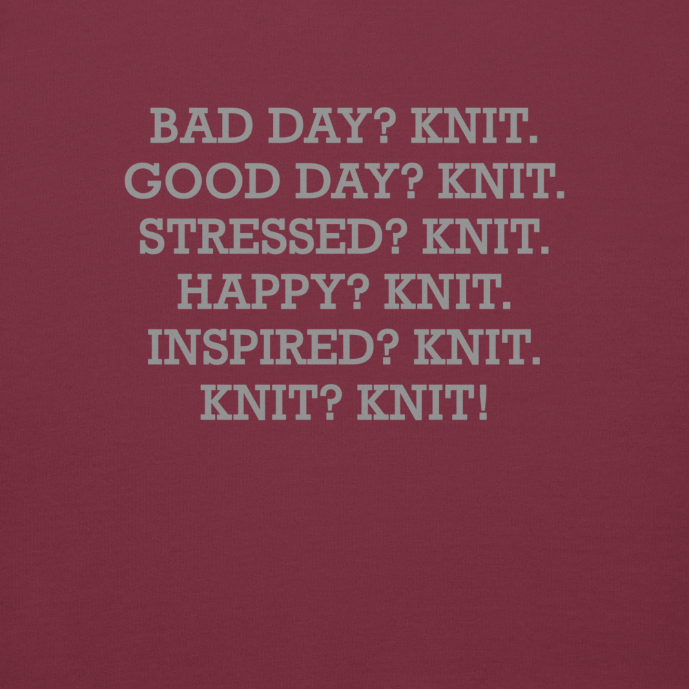 "Bad Day? Knit. Good Day? Knit. Stressed? Knit. Happy? Knit. Inspired? Knit. Knit? Knit!" printed on a maroon background