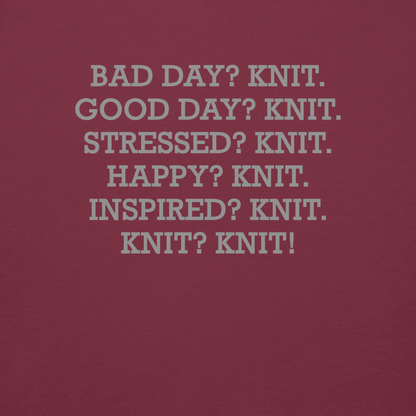 "Bad Day? Knit. Good Day? Knit. Stressed? Knit. Happy? Knit. Inspired? Knit. Knit? Knit!" printed on a maroon background