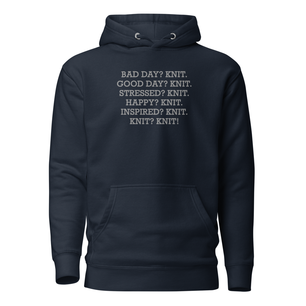 "Bad Day? Knit. Good Day? Knit. Stressed? Knit. Happy? Knit. Inspired? Knit. Knit? Knit!" printed on a navy blazer on an invisible / simulated body