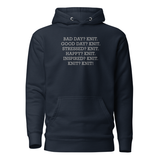 "Bad Day? Knit. Good Day? Knit. Stressed? Knit. Happy? Knit. Inspired? Knit. Knit? Knit!" printed on a navy blazer on an invisible / simulated body