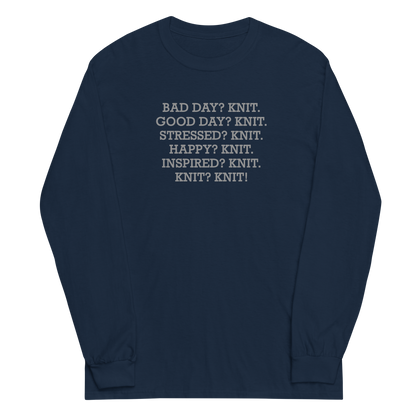 "Bad Day? Knit. Good Day? Knit. Stressed? Knit. Happy? Knit. Inspired? Knit. Knit? Knit!" printed on a navy men's long sleeve shirt laying on a flat surface