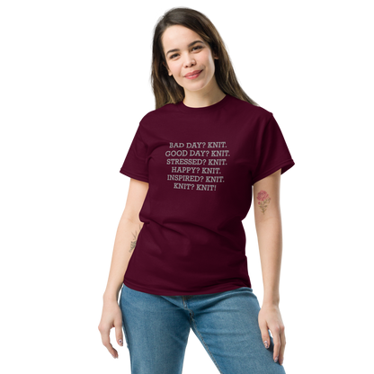 "Bad Day? Knit. Good Day? Knit. Stressed? Knit. Happy? Knit. Inspired? Knit. Knit? Knit!" printed on a maroon unisex classic tee worn by a female