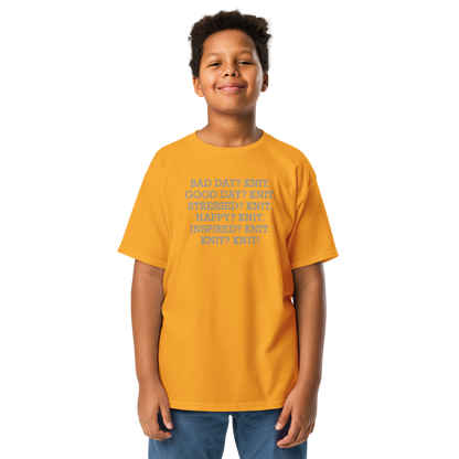 "Bad Day? Knit. Good Day? Knit. Stressed? Knit. Happy? Knit. Inspired? Knit. Knit? Knit!" printed on a gold youth classic tee worn by a male
