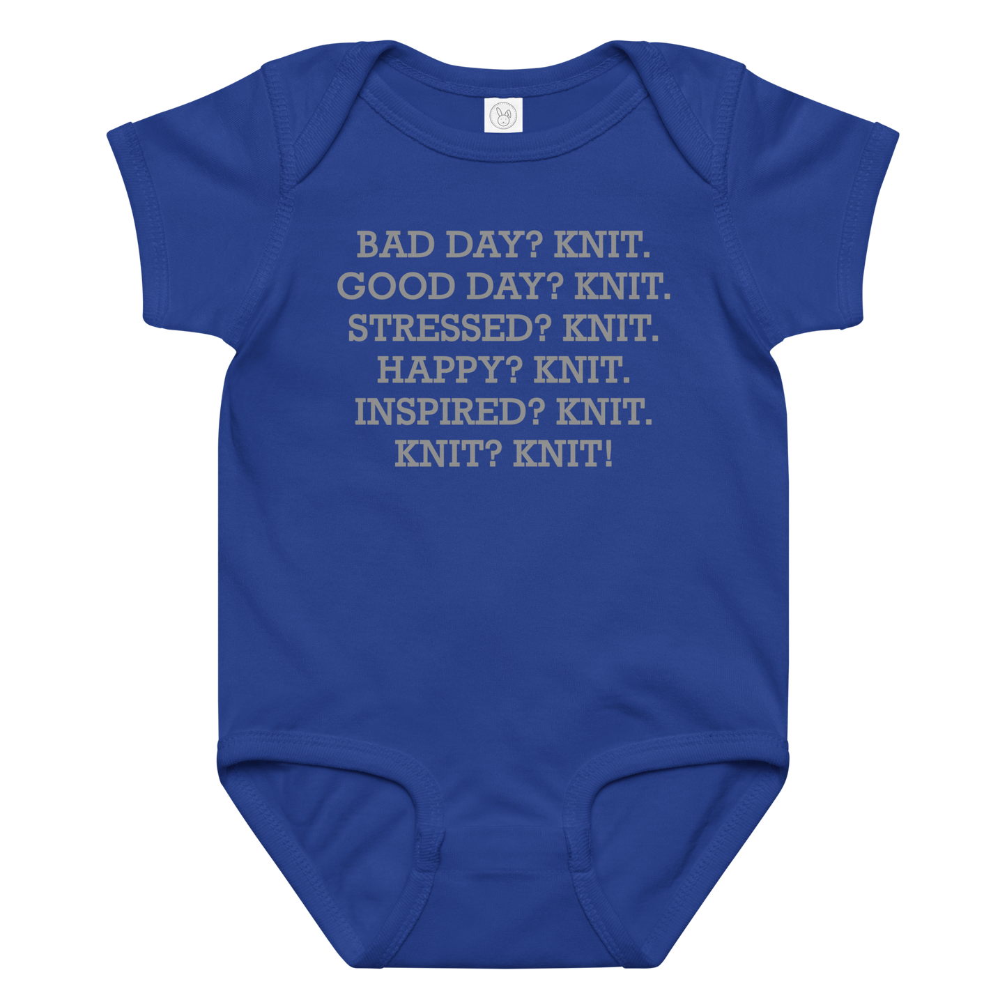 "Bad Day? Knit. Good Day? Knit. Stressed? Knit. Happy? Knit. Inspired? Knit. Knit? Knit!" printed on a royal baby jersey bodysuit laying on a flat surface amongst other clothes
