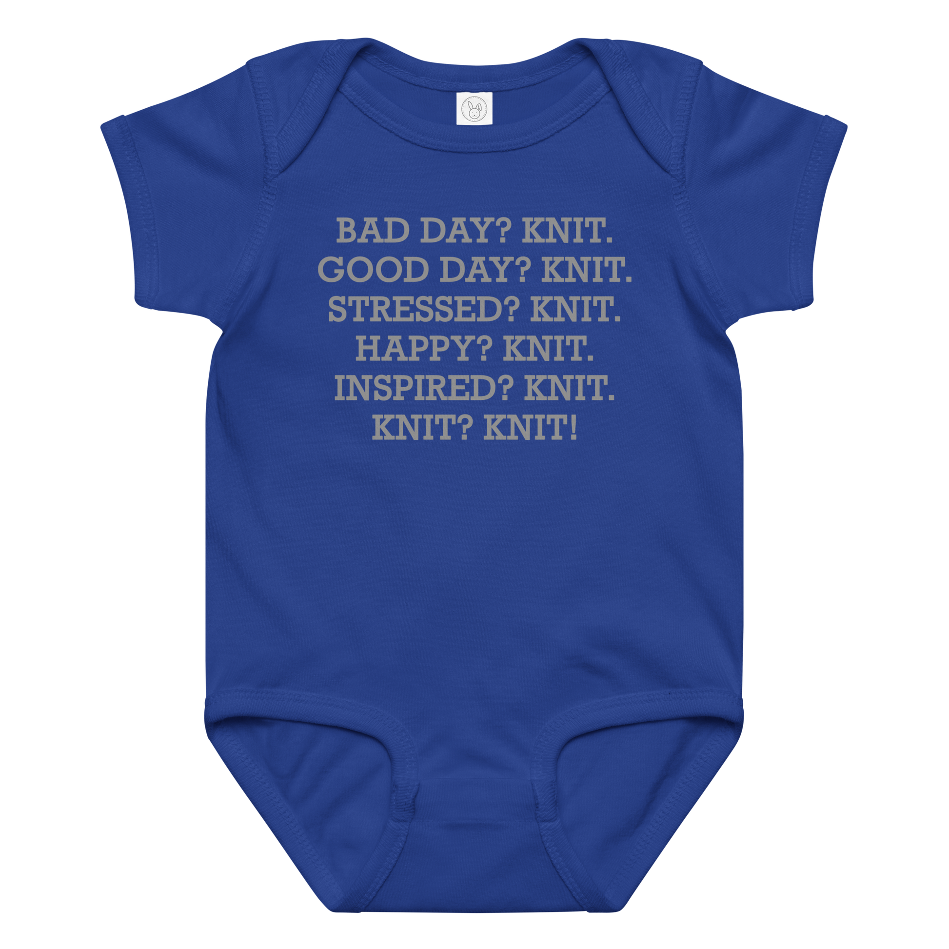 "Bad Day? Knit. Good Day? Knit. Stressed? Knit. Happy? Knit. Inspired? Knit. Knit? Knit!" printed on a royal baby jersey bodysuit laying on a flat surface amongst other clothes