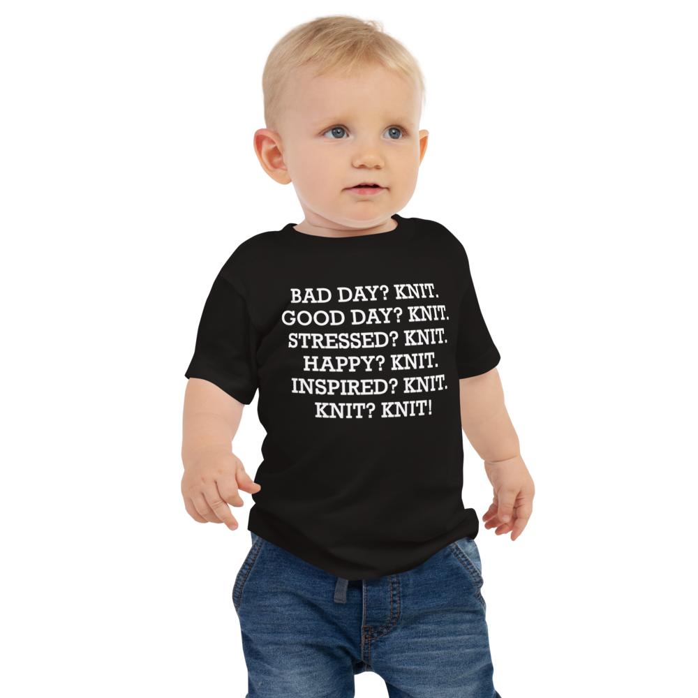 "Bad Day? Knit. Good Day? Knit. Stressed? Knit. Happy? Knit. Inspired? Knit. Knit? Knit!" printed on a black baby jersey short sleeve tee worn by a male