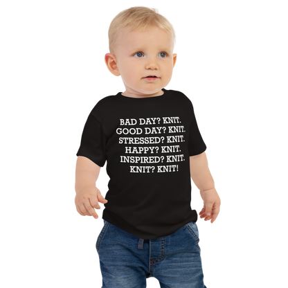 "Bad Day? Knit. Good Day? Knit. Stressed? Knit. Happy? Knit. Inspired? Knit. Knit? Knit!" printed on a black baby jersey short sleeve tee worn by a male