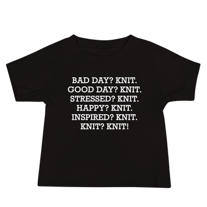 "Bad Day? Knit. Good Day? Knit. Stressed? Knit. Happy? Knit. Inspired? Knit. Knit? Knit!" printed on a black baby jersey short sleeve tee laying on a flat surface