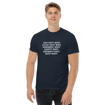"Bad Day? Knit. Good Day? Knit. Stressed? Knit. Happy? Knit. Inspired? Knit. Knit? Knit!" printed on a navy unisex classic tee worn by a male