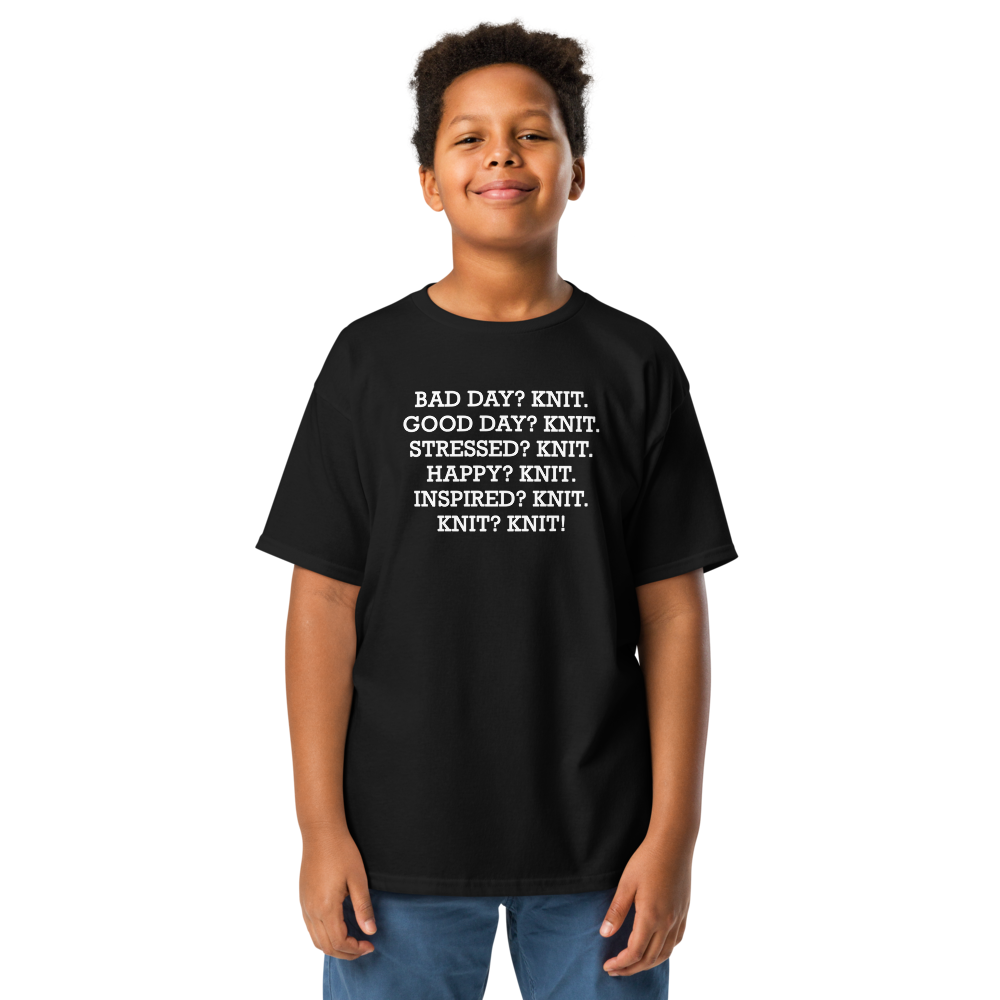 "Bad Day? Knit. Good Day? Knit. Stressed? Knit. Happy? Knit. Inspired? Knit. Knit? Knit!" printed on a black youth classic tee worn by a male