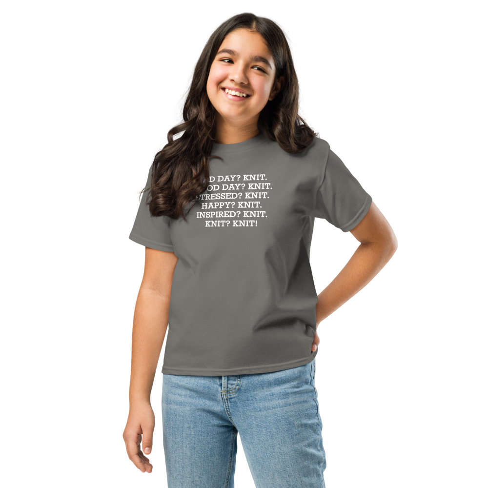 "Bad Day? Knit. Good Day? Knit. Stressed? Knit. Happy? Knit. Inspired? Knit. Knit? Knit!" printed on a charcoal youth classic tee worn by a female