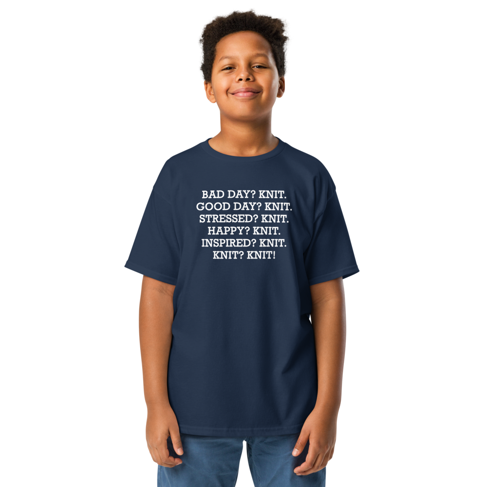 "Bad Day? Knit. Good Day? Knit. Stressed? Knit. Happy? Knit. Inspired? Knit. Knit? Knit!" printed on a navy youth classic tee worn by a male