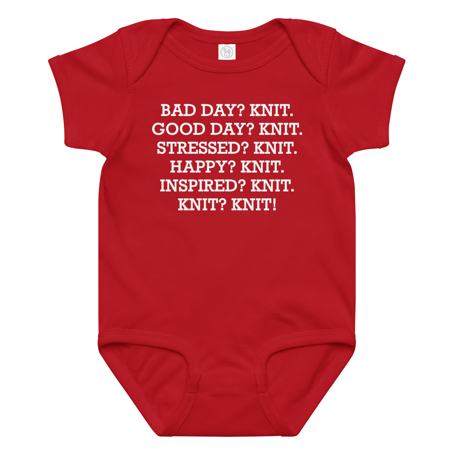 "Bad Day? Knit. Good Day? Knit. Stressed? Knit. Happy? Knit. Inspired? Knit. Knit? Knit!" printed on a red baby jersey bodysuit laying on a flat surface amongst other clothes