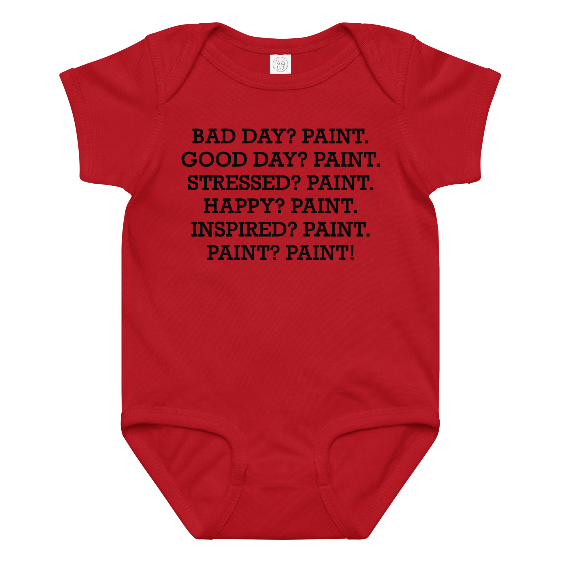 "Bad Day? Paint. Good Day? Paint. Stressed? Paint. Happy? Paint. Inspired? Paint. Paint? Paint!" printed on a red baby jersey bodysuit laying on a flat surface amongst other clothes