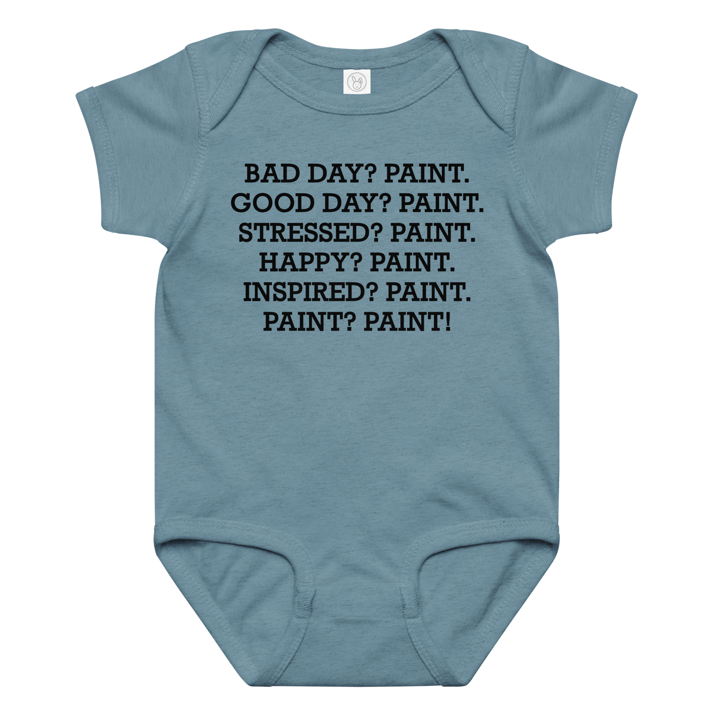 "Bad Day? Paint. Good Day? Paint. Stressed? Paint. Happy? Paint. Inspired? Paint. Paint? Paint!" printed on a vintage indigo baby jersey bodysuit laying on a flat surface amongst other clothes