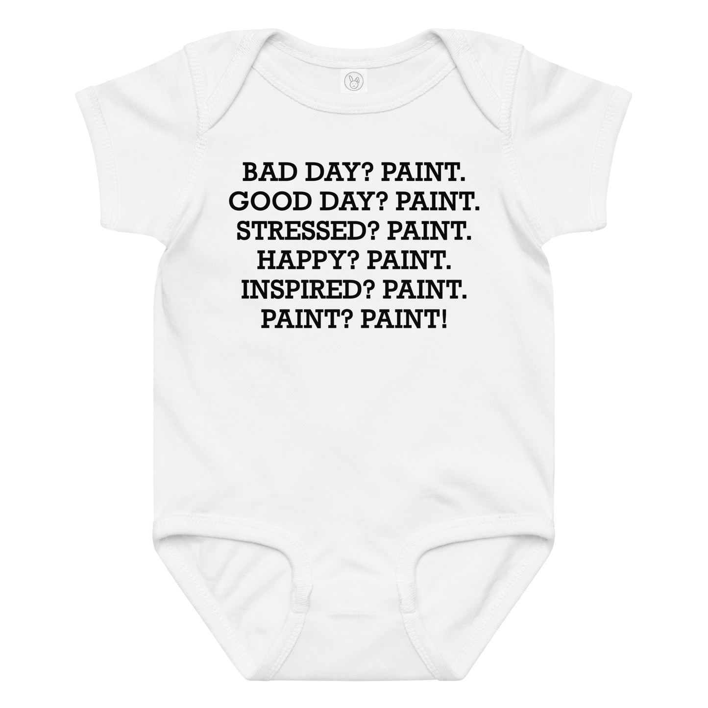 "Bad Day? Paint. Good Day? Paint. Stressed? Paint. Happy? Paint. Inspired? Paint. Paint? Paint!" printed on a white baby jersey bodysuit laying on a flat surface amongst other clothes