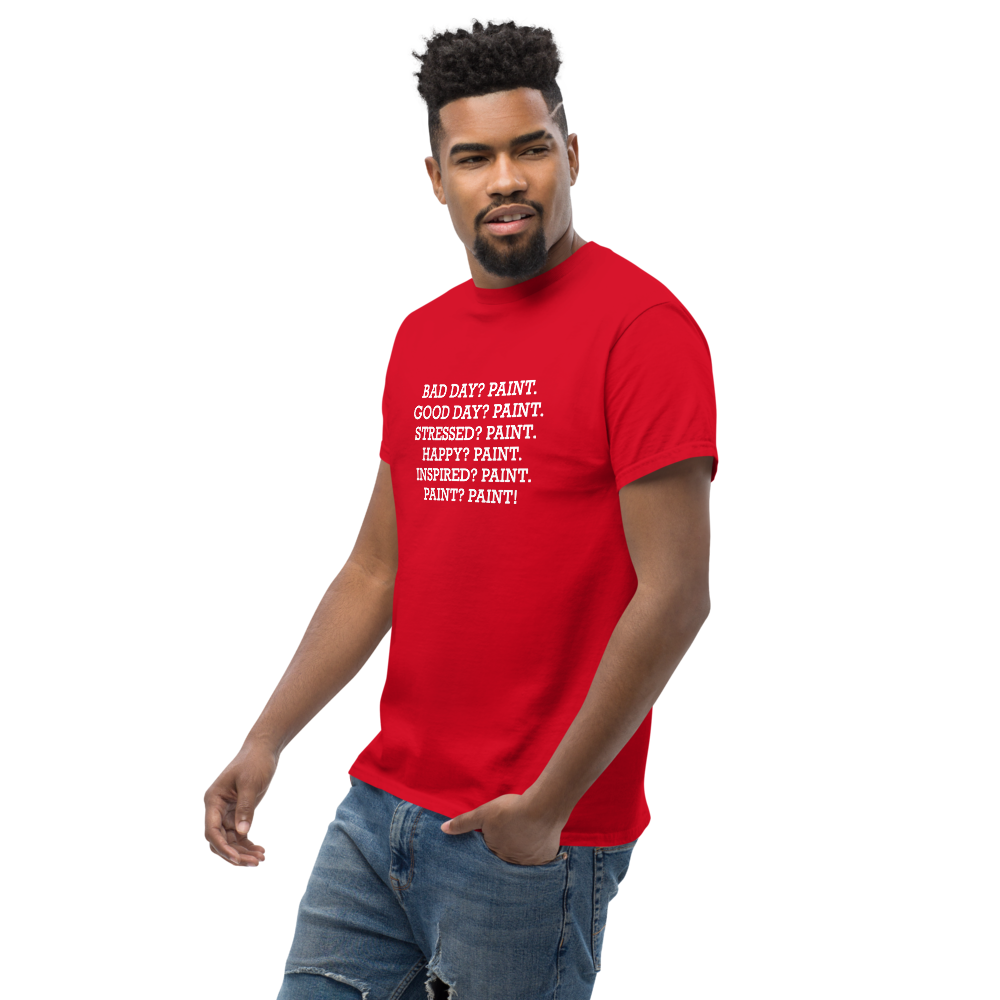 "Bad Day? Paint. Good Day? Paint. Stressed? Paint. Happy? Paint. Inspired? Paint. Paint? Paint!" printed on a red unisex classic tee worn by a male