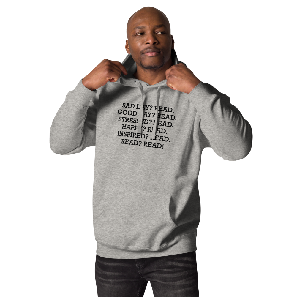 "Bad Day? Read. Good Day? Read. Stressed? Read. Happy? Read. Inspired? Read. Read? Read!" printed on a carbon grey unisex hoodie worn by a male