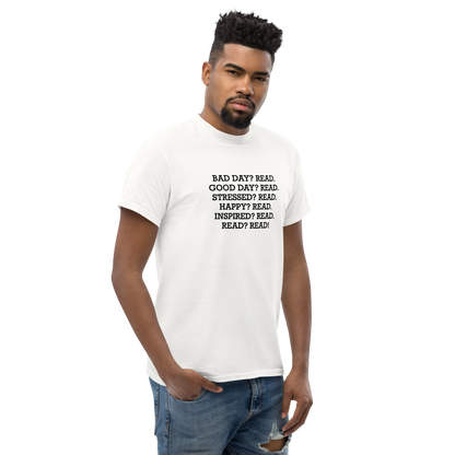 "Bad Day? Read. Good Day? Read. Stressed? Read. Happy? Read. Inspired? Read. Read? Read!" printed on a white unisex classic tee worn by a male