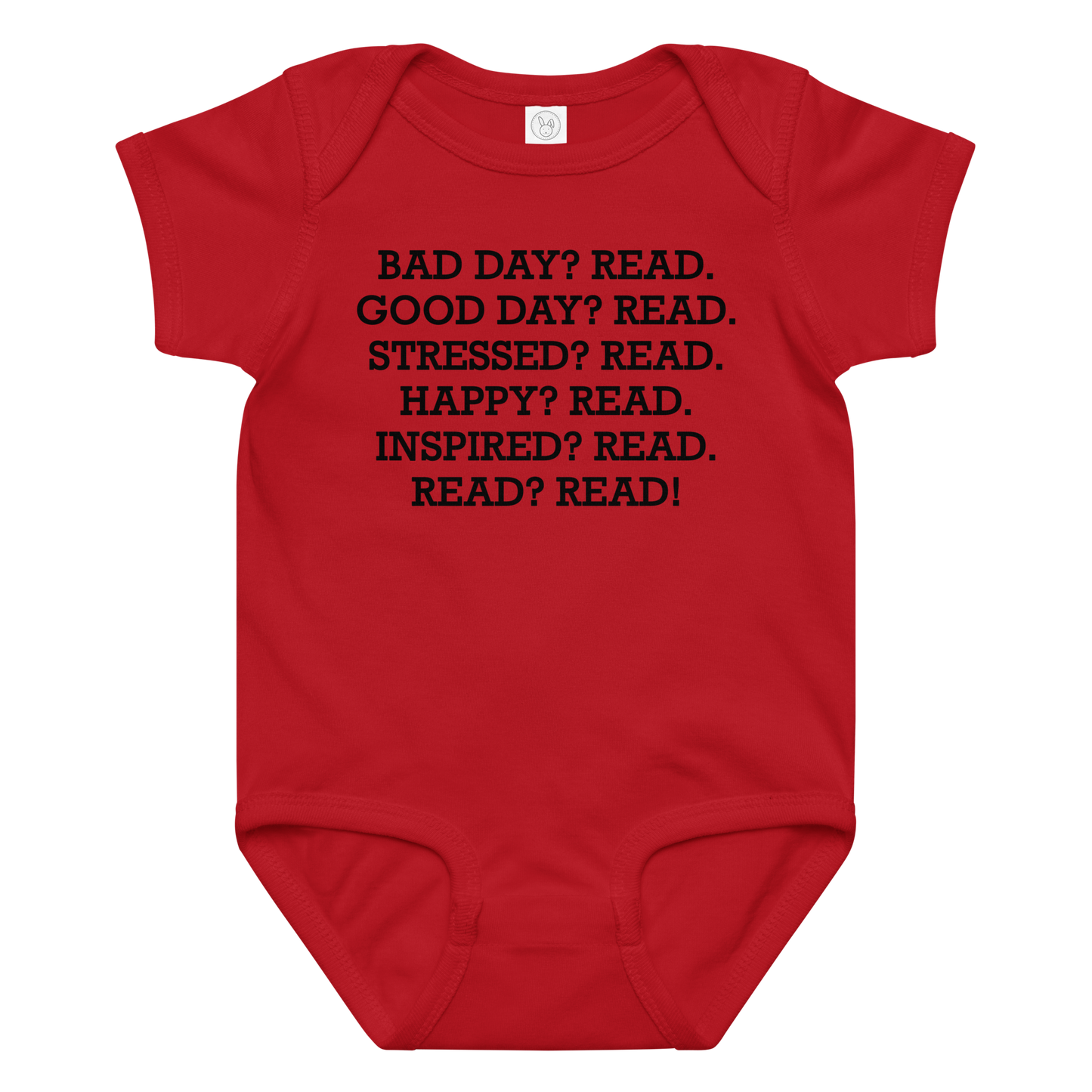"Bad Day? Read. Good Day? Read. Stressed? Read. Happy? Read. Inspired? Read. Read? Read!" printed on a red baby jersey bodysuit laying on a flat surface amongst other clothes