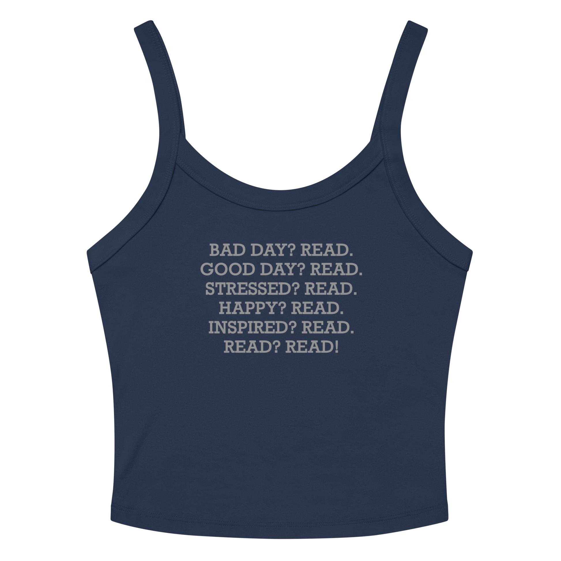"Bad Day? Read. Good Day? Read. Stressed? Read. Happy? Read. Inspired? Read. Read? Read!" printed on a solid navy blend women's micro-rib tanktop laying on a flat surface amongst sunglasses and shorts