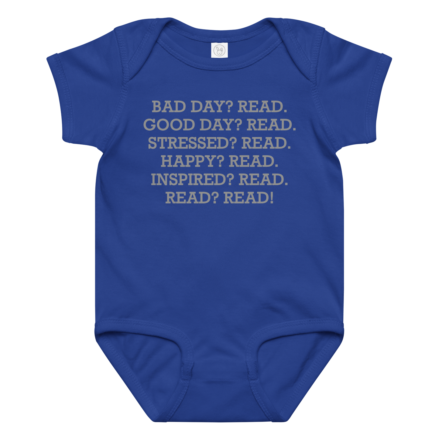 "Bad Day? Read. Good Day? Read. Stressed? Read. Happy? Read. Inspired? Read. Read? Read!" printed on a royal baby jersey bodysuit laying on a flat surface amongst other clothes