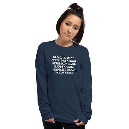 "Bad Day? Read. Good Day? Read. Stressed? Read. Happy? Read. Inspired? Read. Read? Read!" printed on a navy men's long sleeve shirt worn by a female