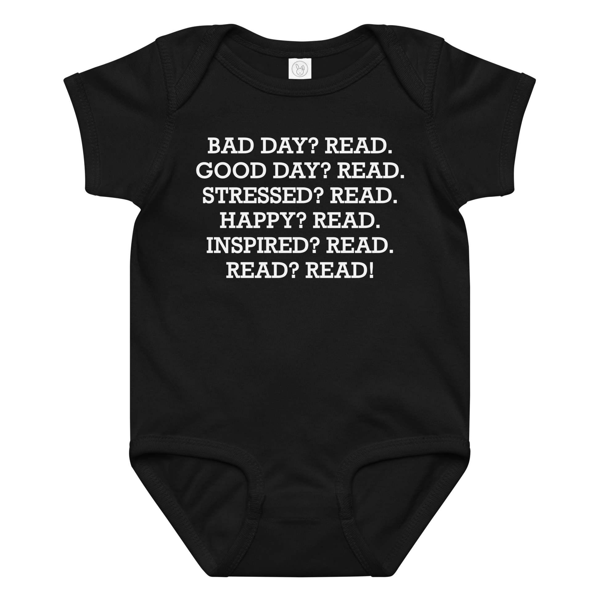 "Bad Day? Read. Good Day? Read. Stressed? Read. Happy? Read. Inspired? Read. Read? Read!" printed on a black baby jersey bodysuit laying on a flat surface amongst other clothes