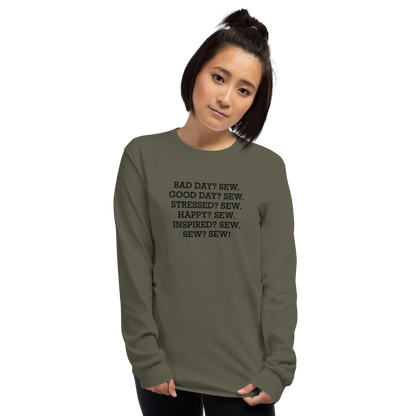 "Bad Day? Sew. Good Day? Sew. Stressed? Sew. Happy? Sew. Inspired? Sew. Sew? Sew!" printed on a military green men's long sleeve shirt worn by a female