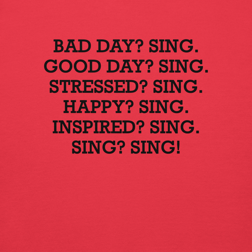 "Bad Day? Sing. Good Day? Sing. Stressed? Sing. Happy? Sing. Inspired? Sing. Sing? Sing!" printed on a team red background
