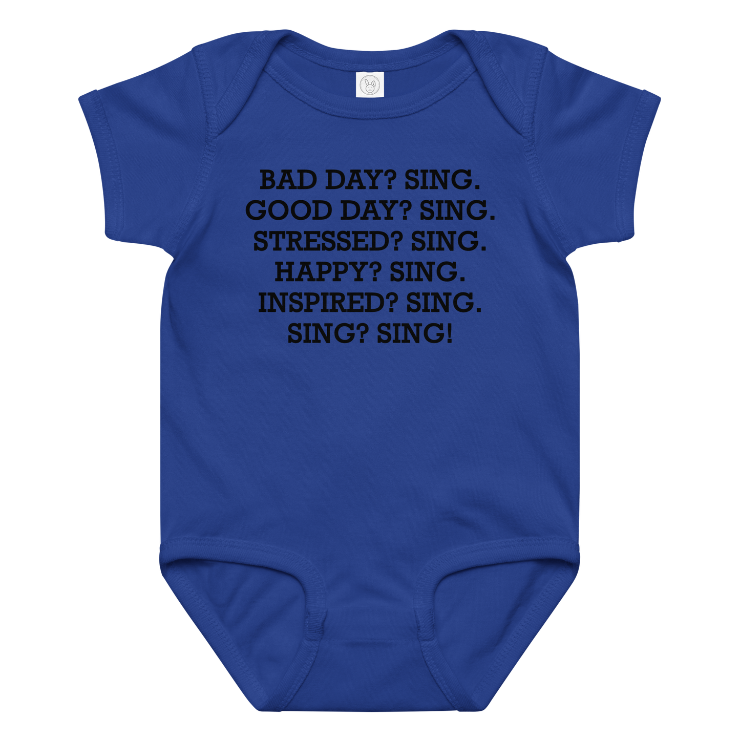 "Bad Day? Sing. Good Day? Sing. Stressed? Sing. Happy? Sing. Inspired? Sing. Sing? Sing!" printed on a royal baby jersey bodysuit laying on a flat surface amongst other clothes