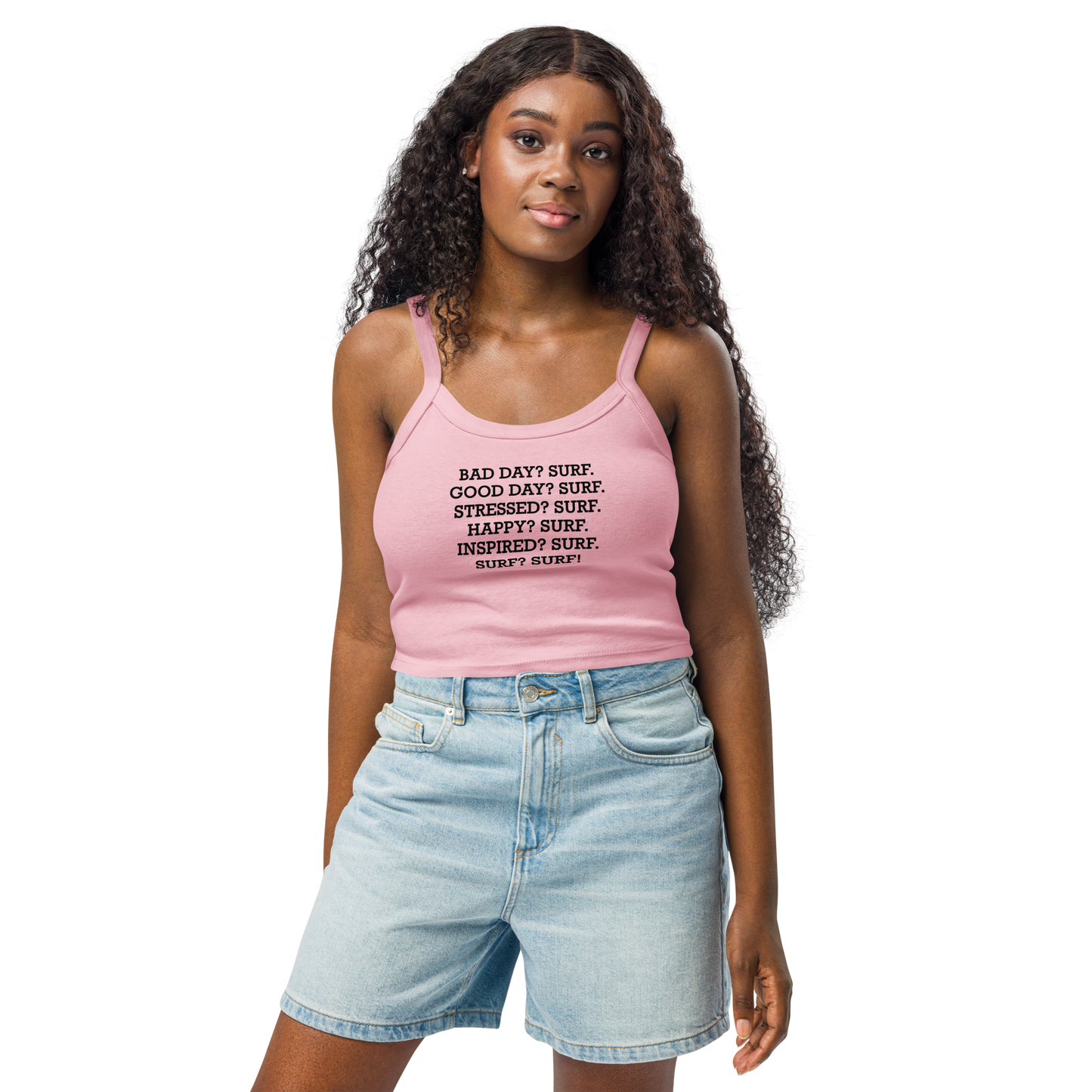 "Bad Day? Surf. Good Day? Surf. Stressed? Surf. Happy? Surf. Inspired? Surf. Surf? Surf!" printed on a solid pink blend women's micro-rib tanktop worn by a female