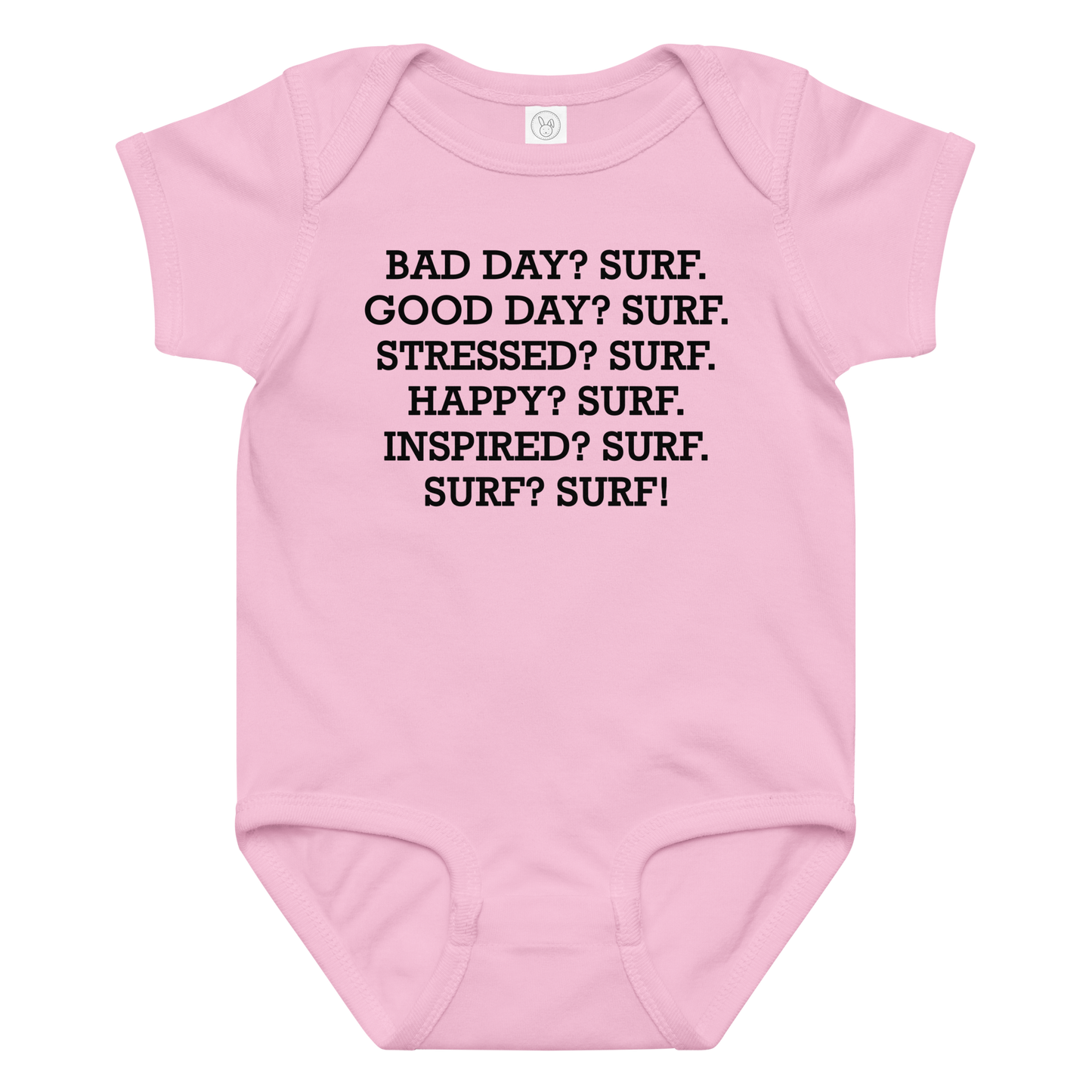 "Bad Day? Surf. Good Day? Surf. Stressed? Surf. Happy? Surf. Inspired? Surf. Surf? Surf!" printed on a pink baby jersey bodysuit laying on a flat surface amongst other clothes