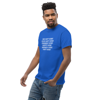 "Bad Day? Surf. Good Day? Surf. Stressed? Surf. Happy? Surf. Inspired? Surf. Surf? Surf!" printed on a royal unisex classic tee worn by a male
