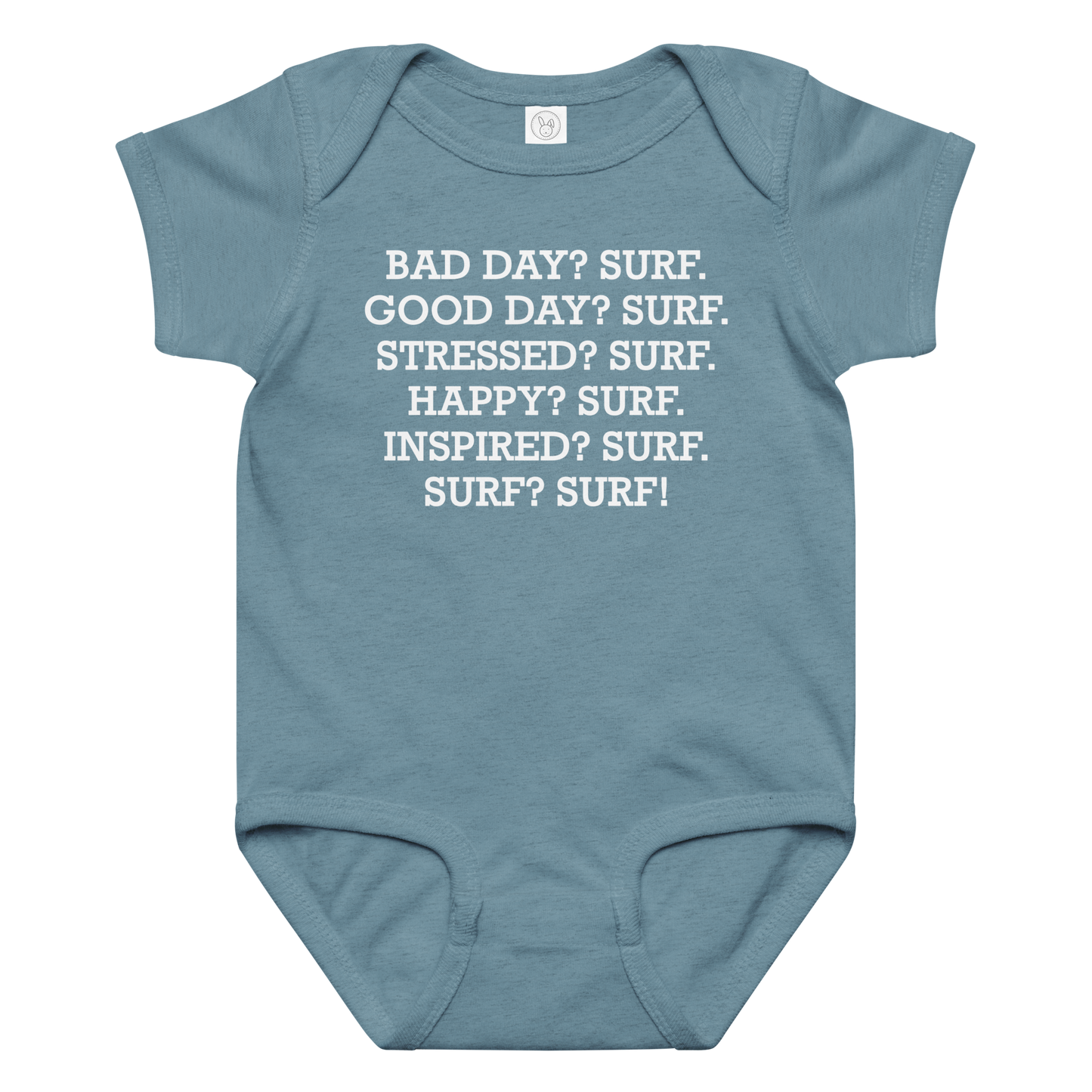 "Bad Day? Surf. Good Day? Surf. Stressed? Surf. Happy? Surf. Inspired? Surf. Surf? Surf!" printed on a vintage indigo baby jersey bodysuit laying on a flat surface amongst other clothes