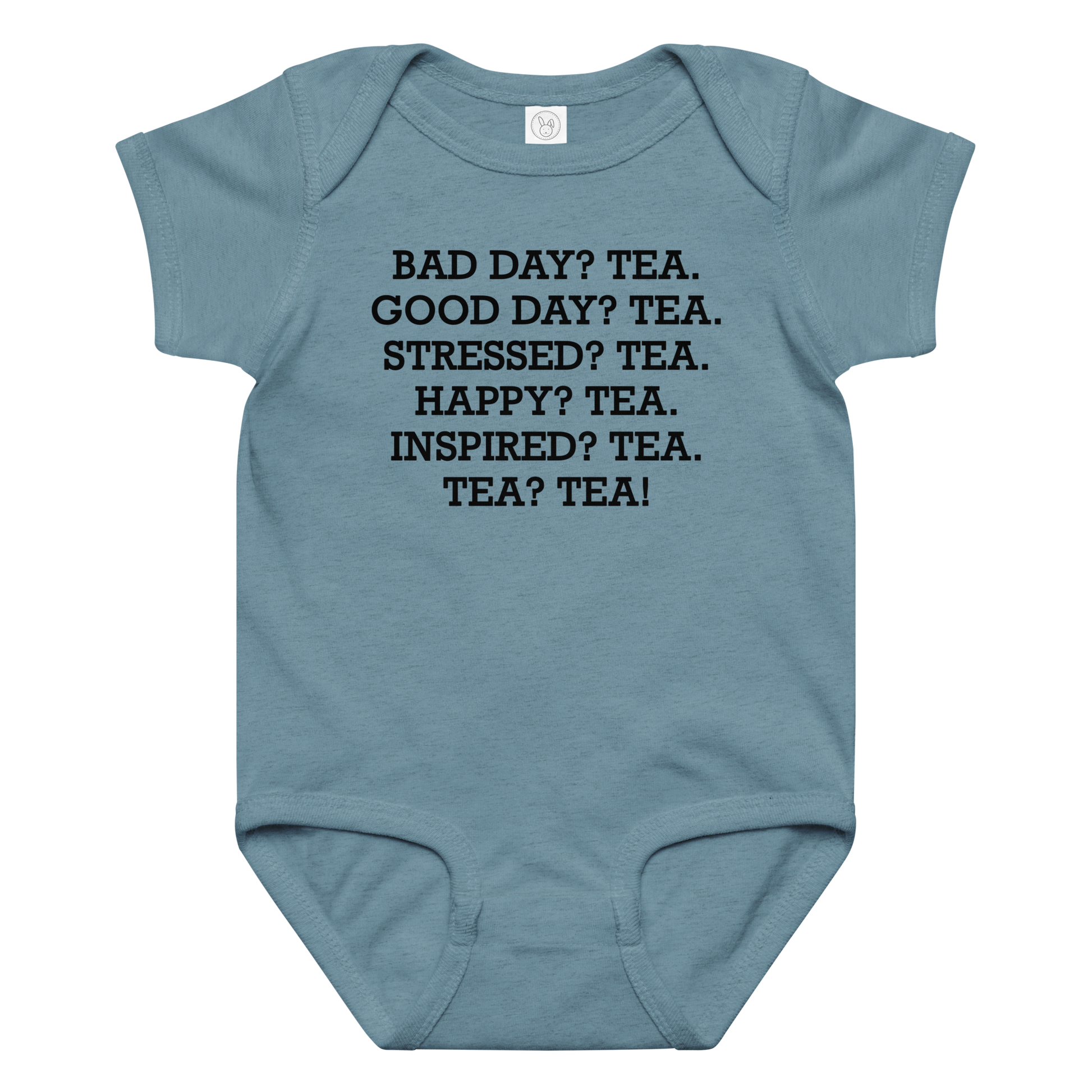 "Bad Day? Tea. Good Day? Tea. Stressed? Tea. Happy? Tea. Inspired? Tea. Tea? Tea!" printed on a vintage indigo baby jersey bodysuit laying on a flat surface amongst other clothes