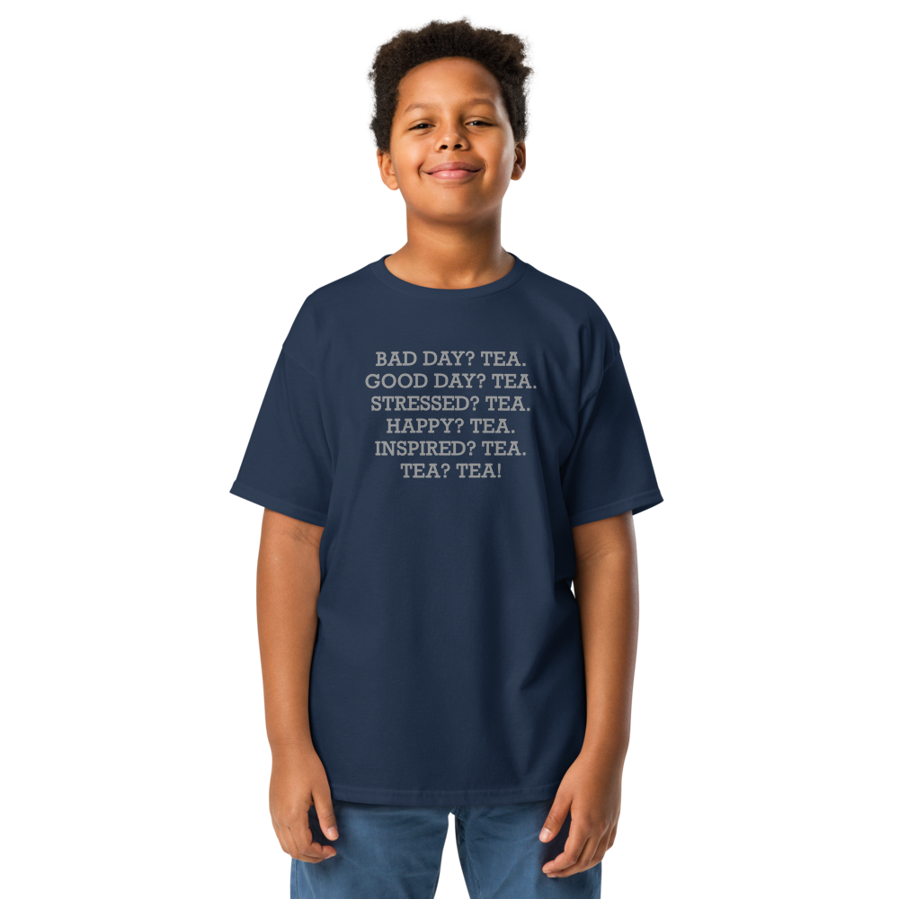 "Bad Day? Tea. Good Day? Tea. Stressed? Tea. Happy? Tea. Inspired? Tea. Tea? Tea!" printed on a navy youth classic tee worn by a male