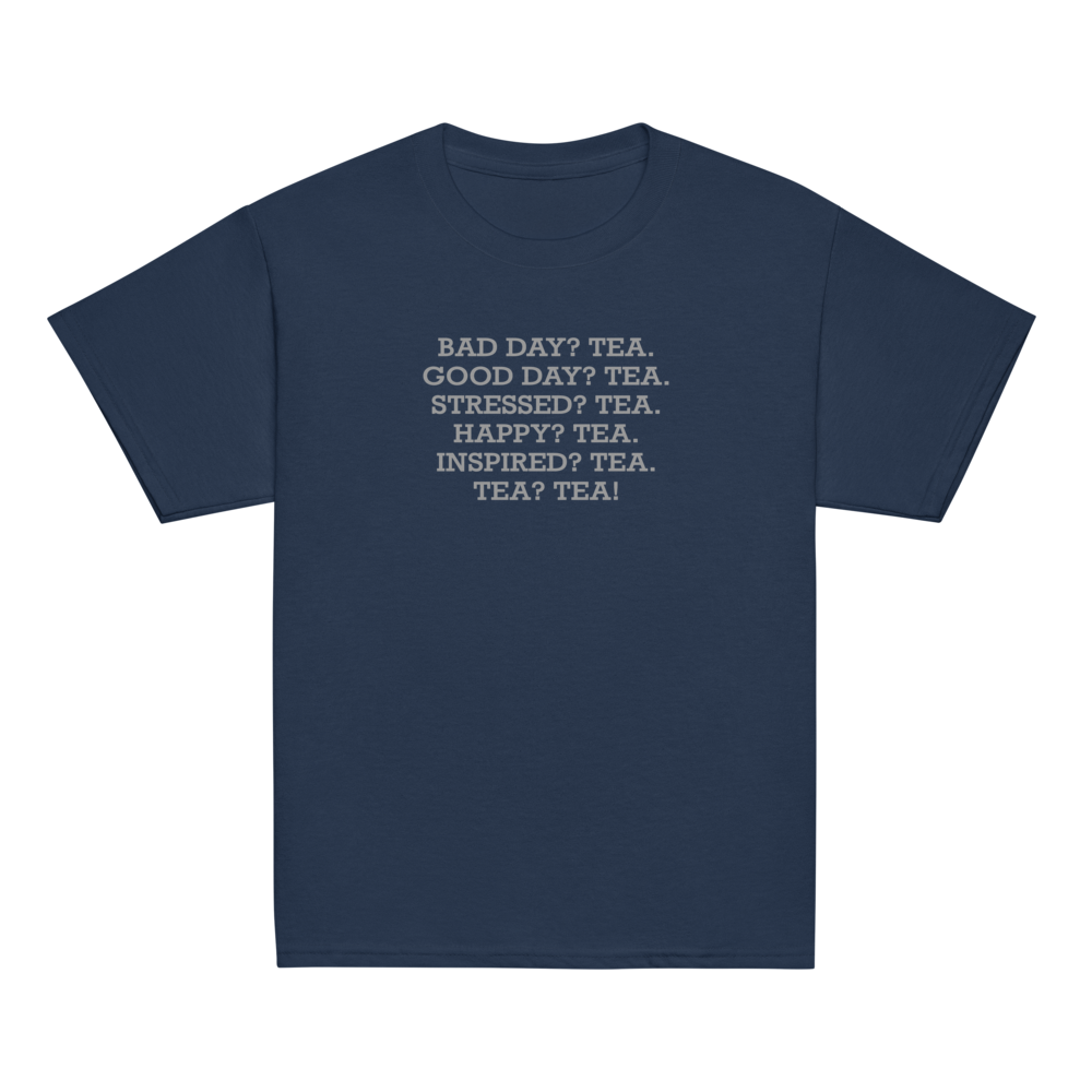 "Bad Day? Tea. Good Day? Tea. Stressed? Tea. Happy? Tea. Inspired? Tea. Tea? Tea!" printed on a navy youth classic tee laying on a flat surface