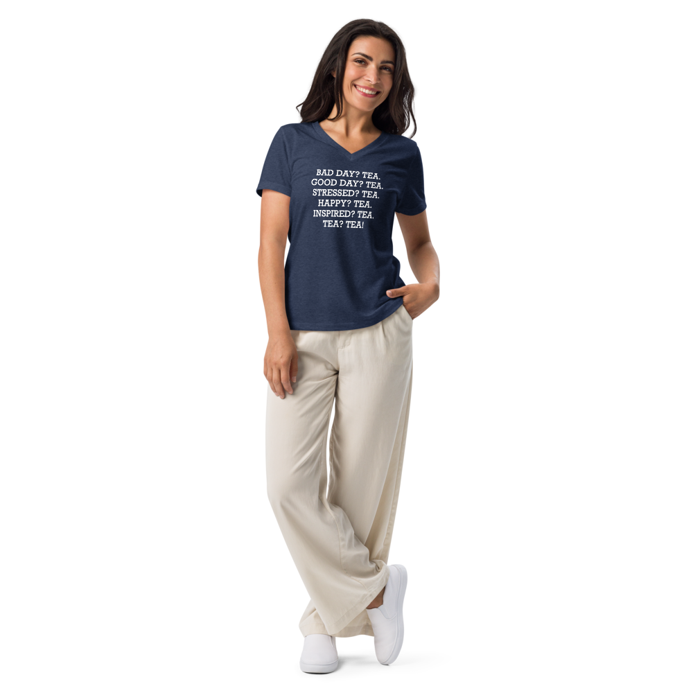 "Bad Day? Tea. Good Day? Tea. Stressed? Tea. Happy? Tea. Inspired? Tea. Tea? Tea!" printed on a heather navy women's relaxed v-neck t-shirt worn by a female