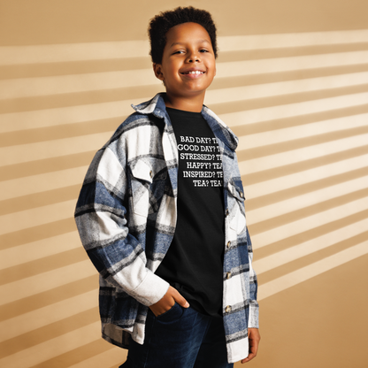 "Bad Day? Tea. Good Day? Tea. Stressed? Tea. Happy? Tea. Inspired? Tea. Tea? Tea!" printed on a black youth classic tee worn by a male also wearing a jacket
