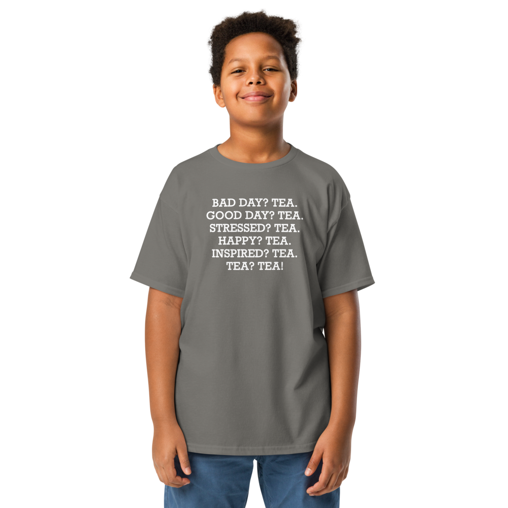 "Bad Day? Tea. Good Day? Tea. Stressed? Tea. Happy? Tea. Inspired? Tea. Tea? Tea!" printed on a charcoal youth classic tee worn by a male