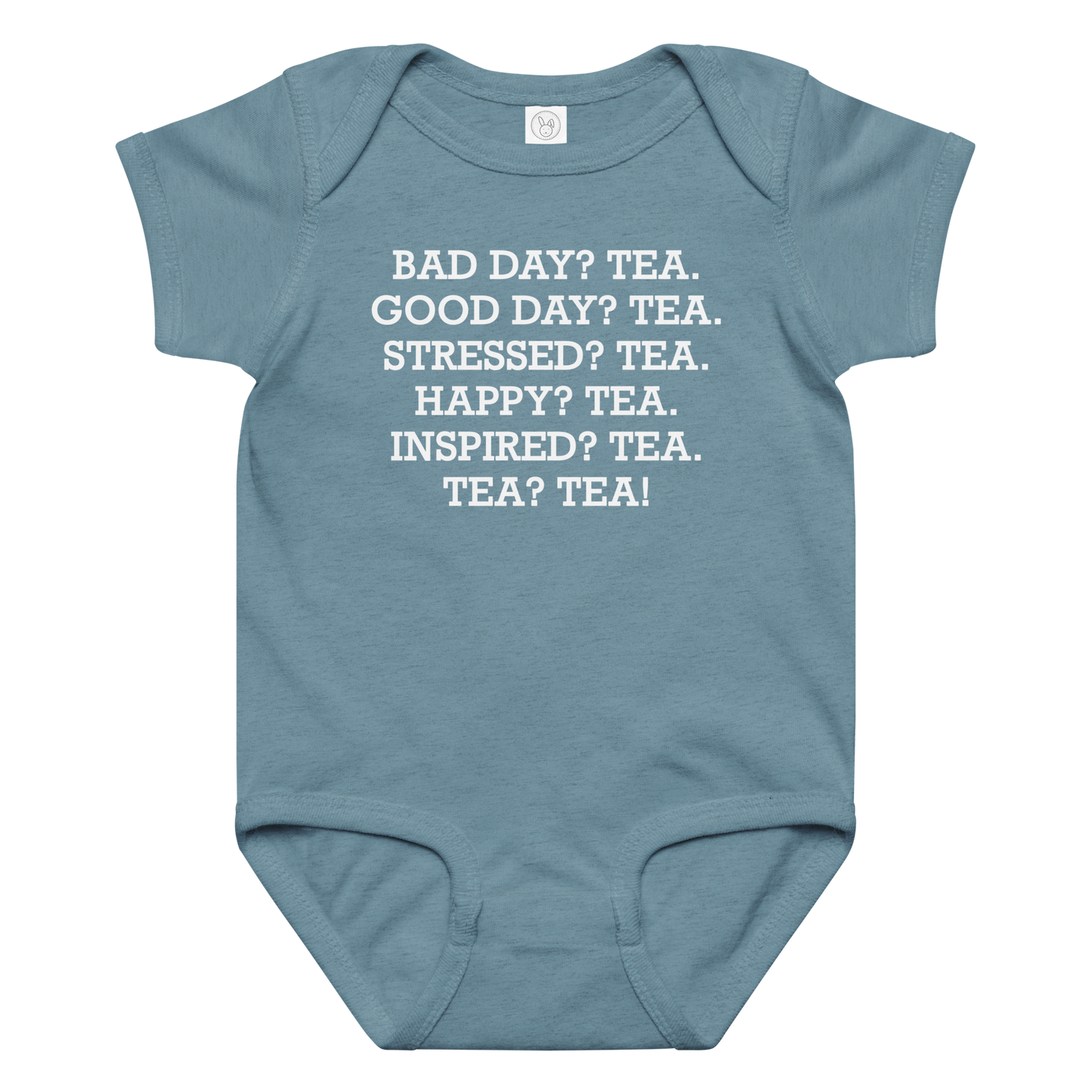 "Bad Day? Tea. Good Day? Tea. Stressed? Tea. Happy? Tea. Inspired? Tea. Tea? Tea!" printed on a vintage indigo baby jersey bodysuit laying on a flat surface amongst other clothes