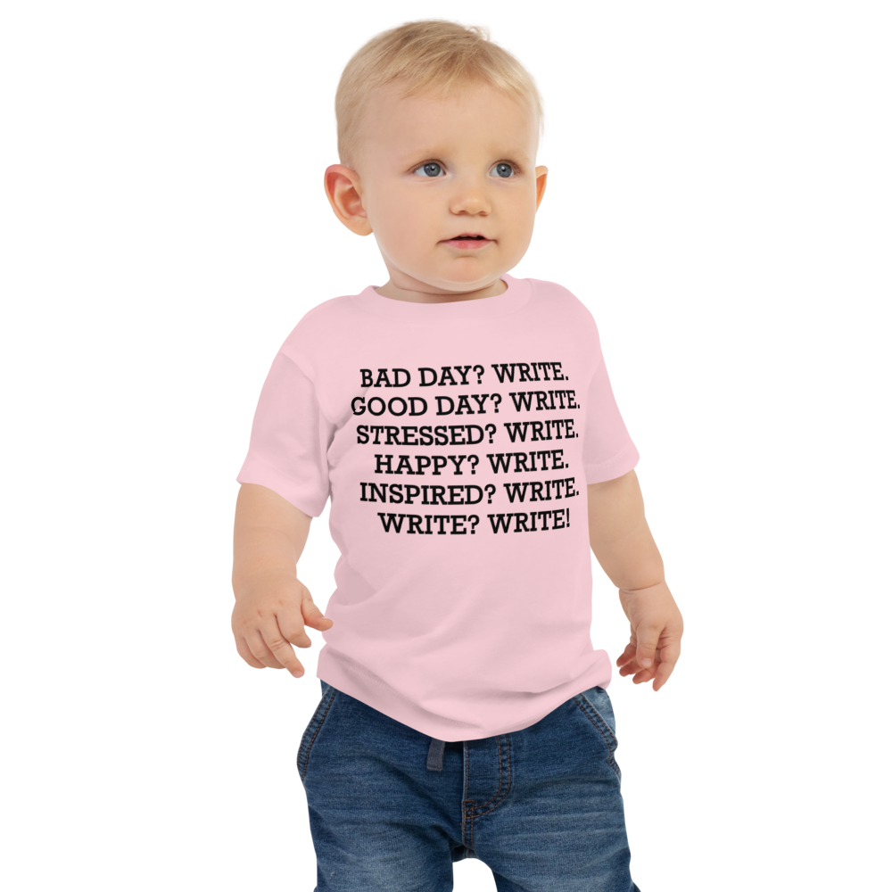 "Bad Day? Write. Good Day? Write. Stressed? Write. Happy? Write. Inspired? Write. Write? Write!" printed on a pink baby jersey short sleeve tee worn by a male