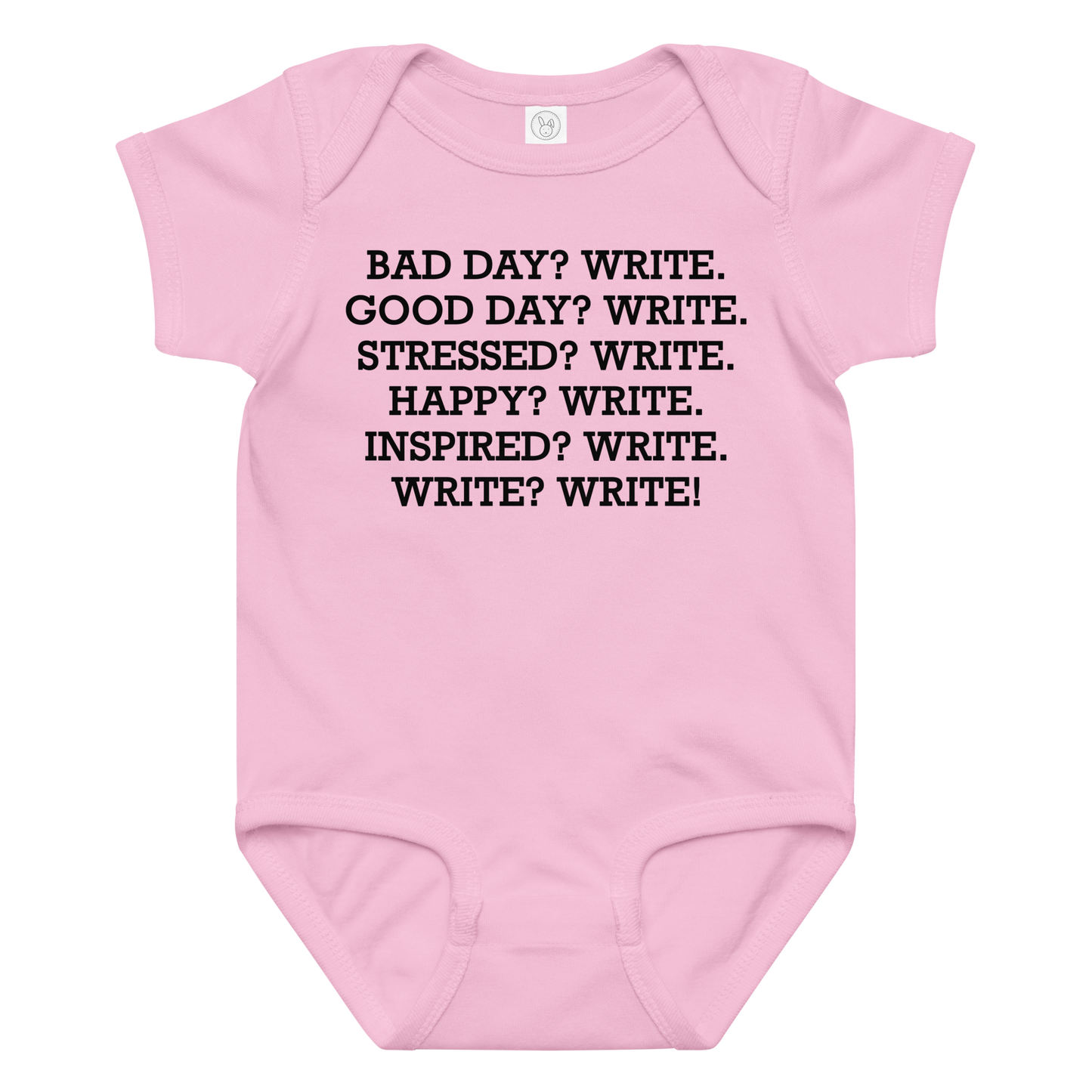 "Bad Day? Write. Good Day? Write. Stressed? Write. Happy? Write. Inspired? Write. Write? Write!" printed on a pink baby jersey bodysuit laying on a flat surface amongst other clothes