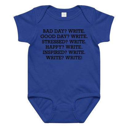 "Bad Day? Write. Good Day? Write. Stressed? Write. Happy? Write. Inspired? Write. Write? Write!" printed on a royal baby jersey bodysuit laying on a flat surface amongst other clothes