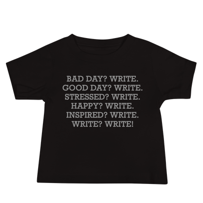 "Bad Day? Write. Good Day? Write. Stressed? Write. Happy? Write. Inspired? Write. Write? Write!" printed on a black baby jersey short sleeve tee laying on a flat surface