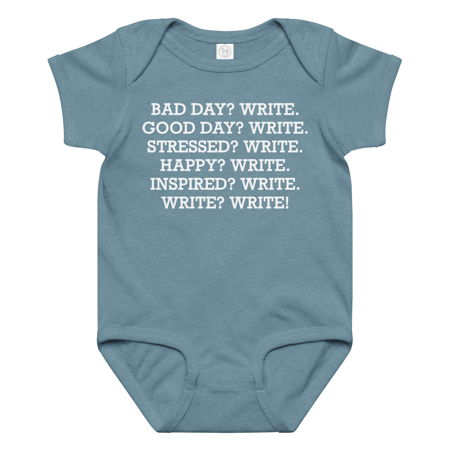 "Bad Day? Write. Good Day? Write. Stressed? Write. Happy? Write. Inspired? Write. Write? Write!" printed on a vintage indigo baby jersey bodysuit laying on a flat surface amongst other clothes